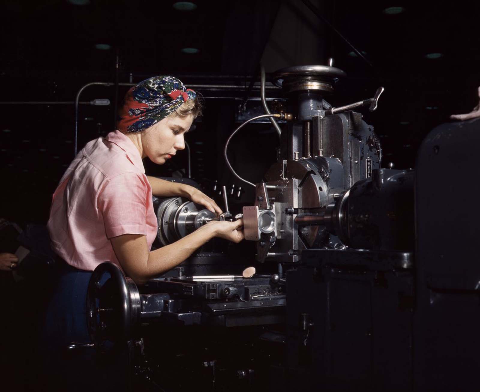 A machinist at work at the Douglas Aircraft Company plant in Long Beach, California, 1942.