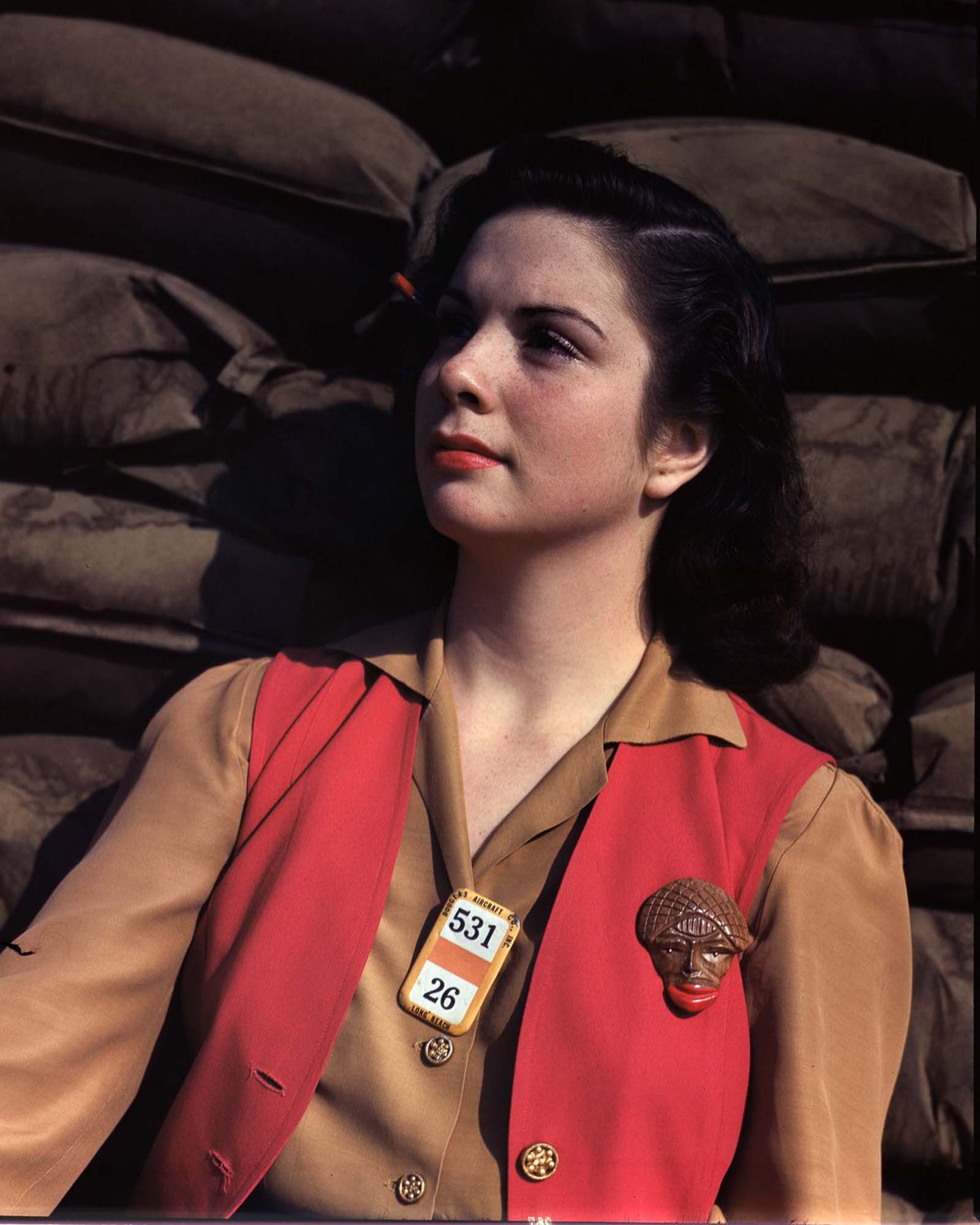 A Douglas Aircraft Company employee on her lunch break at the plant in Long Beach, California, 1942.