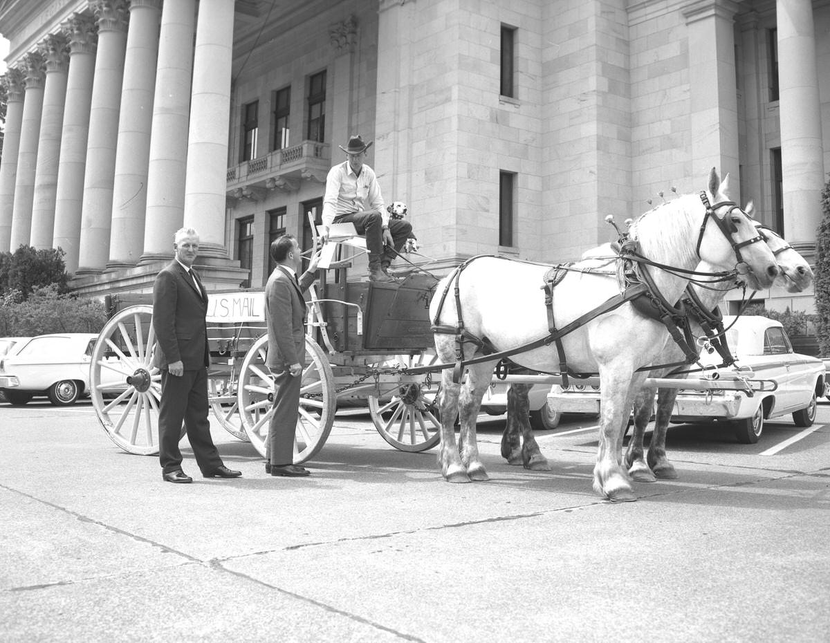 Evans receiving letter from Pony Express, 1965