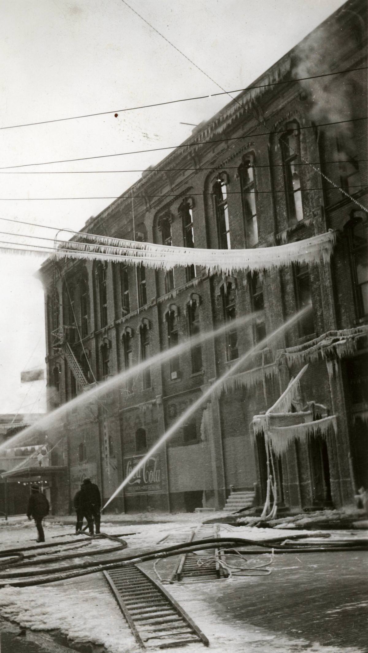 Firefighters putting out fire at Odd Fellows Hall