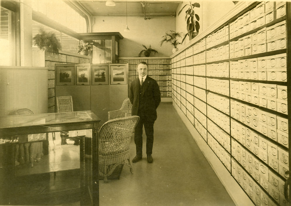 A man identified as Lewis Chalmers Musgrove, proprietor of the Musgrove Shoe Store, Olympia, 1890s.