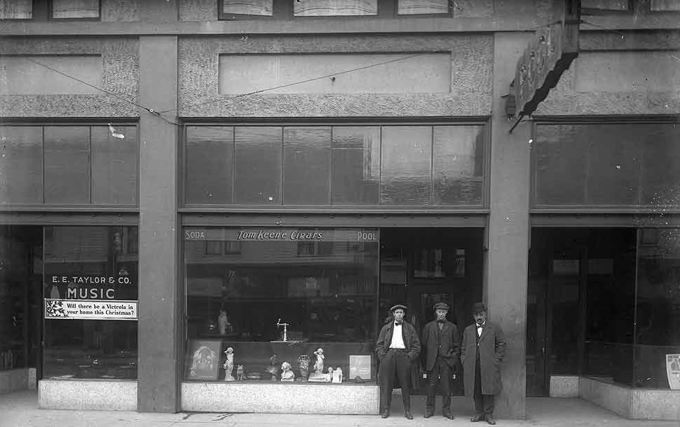E.E. Taylor music store, and a pool hall, located at 309 and 307 4th Ave., Olympia, 1916