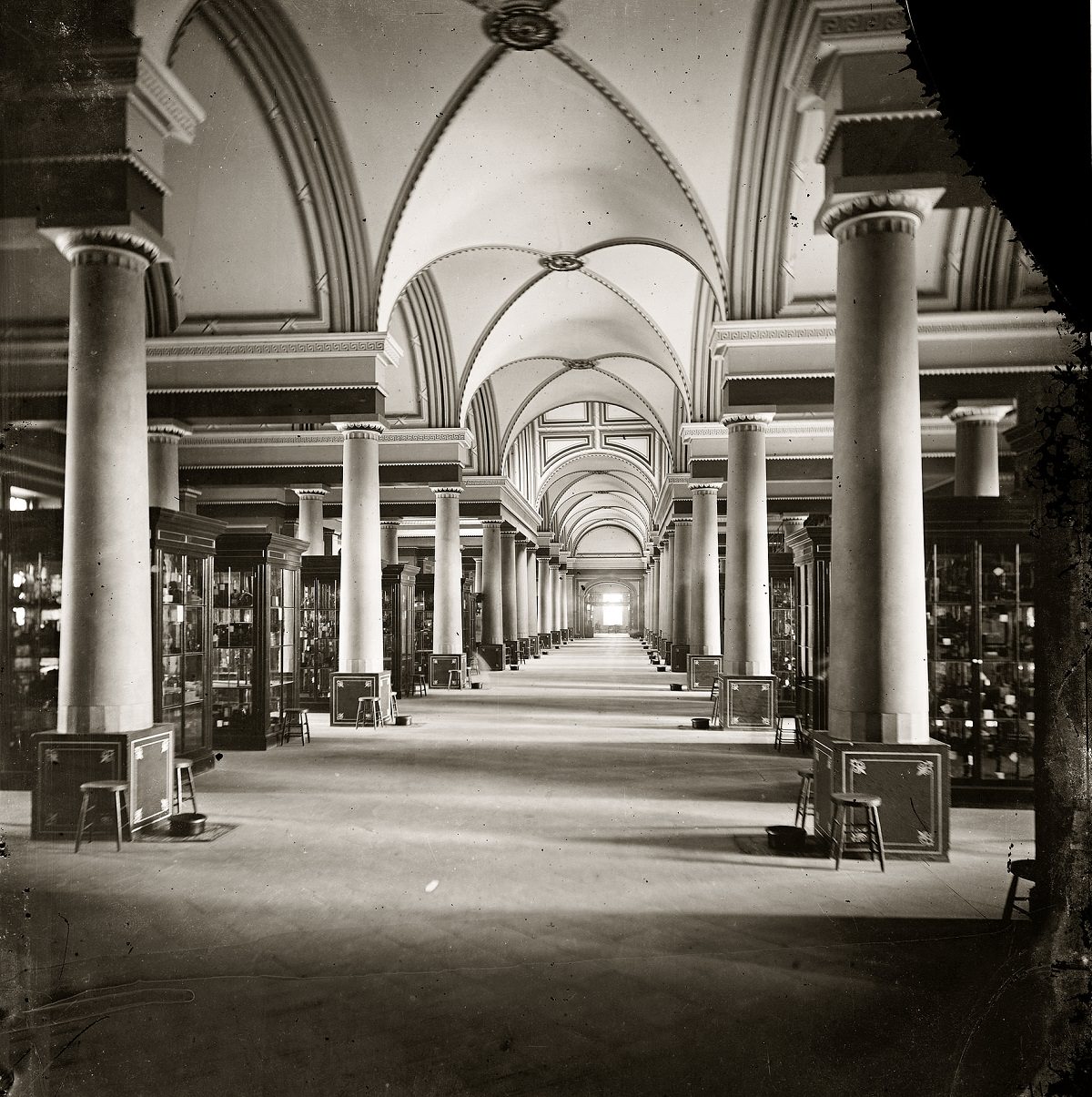 Old Patent Office model room (1861-65)." Wet-plate glass negative from the Brady-Handy Collection, Washington, D.C., 1865.