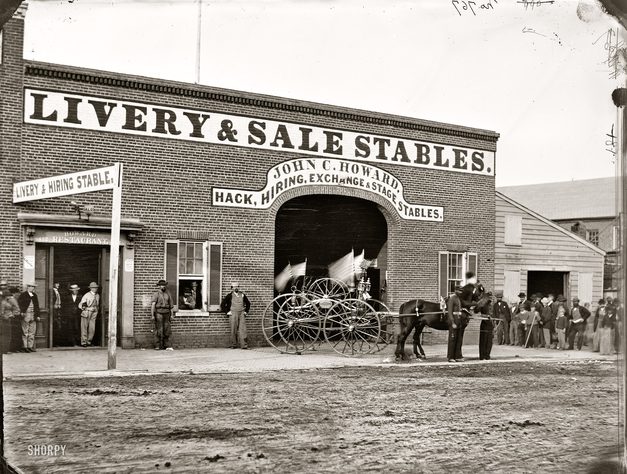 John C. Howard's stable on G Street between 6th and 7th, where John H. Surratt kept horses before leaving town on April, Washington, D.C., 1865.