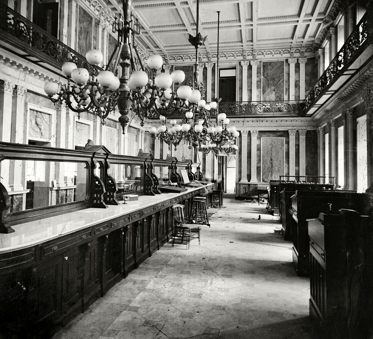 Treasury Department in Lincoln's time (Cash Room behind the desks)." At least two spectral presences here. Civil War glass negative collection, Washington, D.C., 1863.