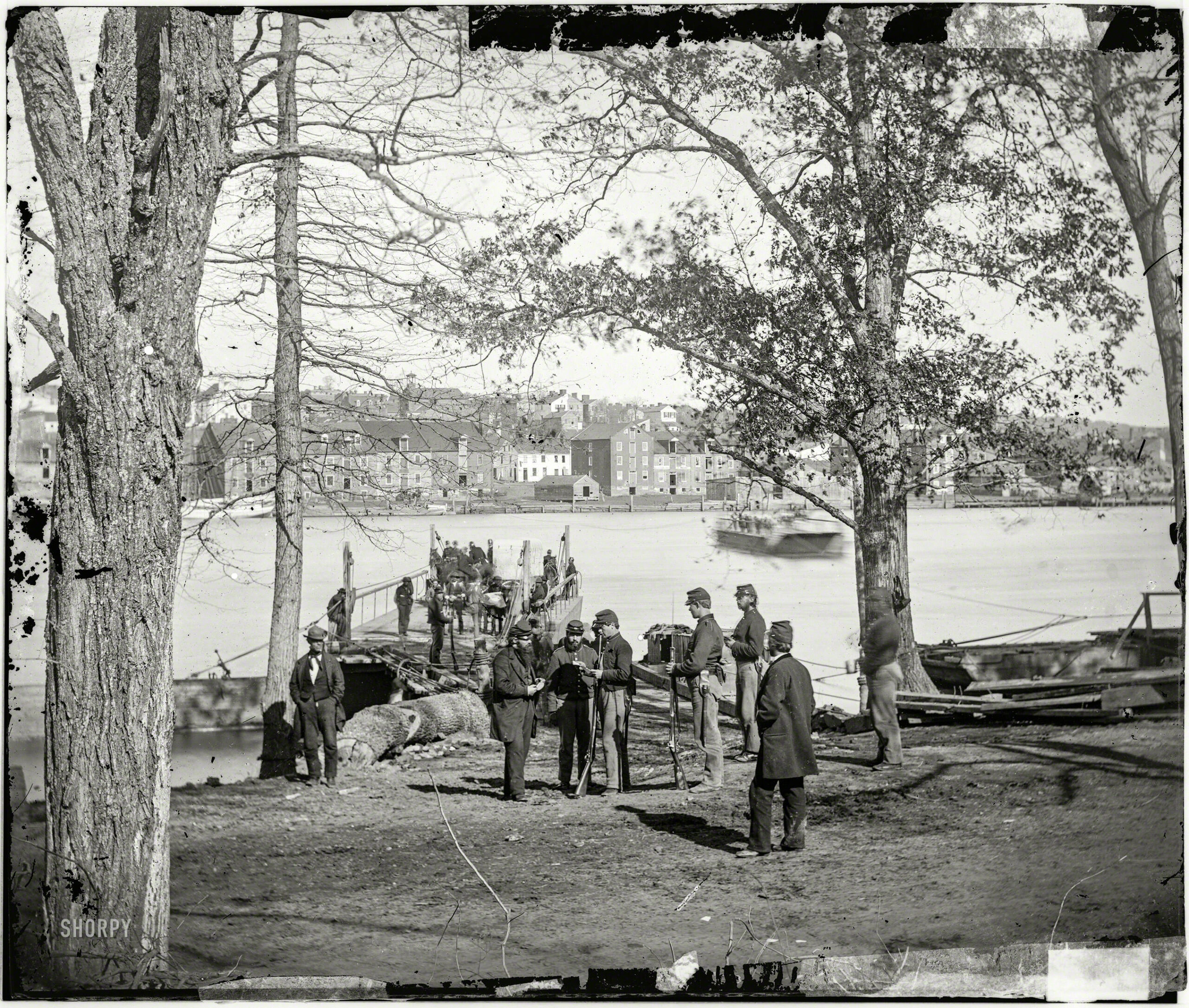 Guards at ferry landing on Mason's Island examining a pass, Washington, D.C., 1861