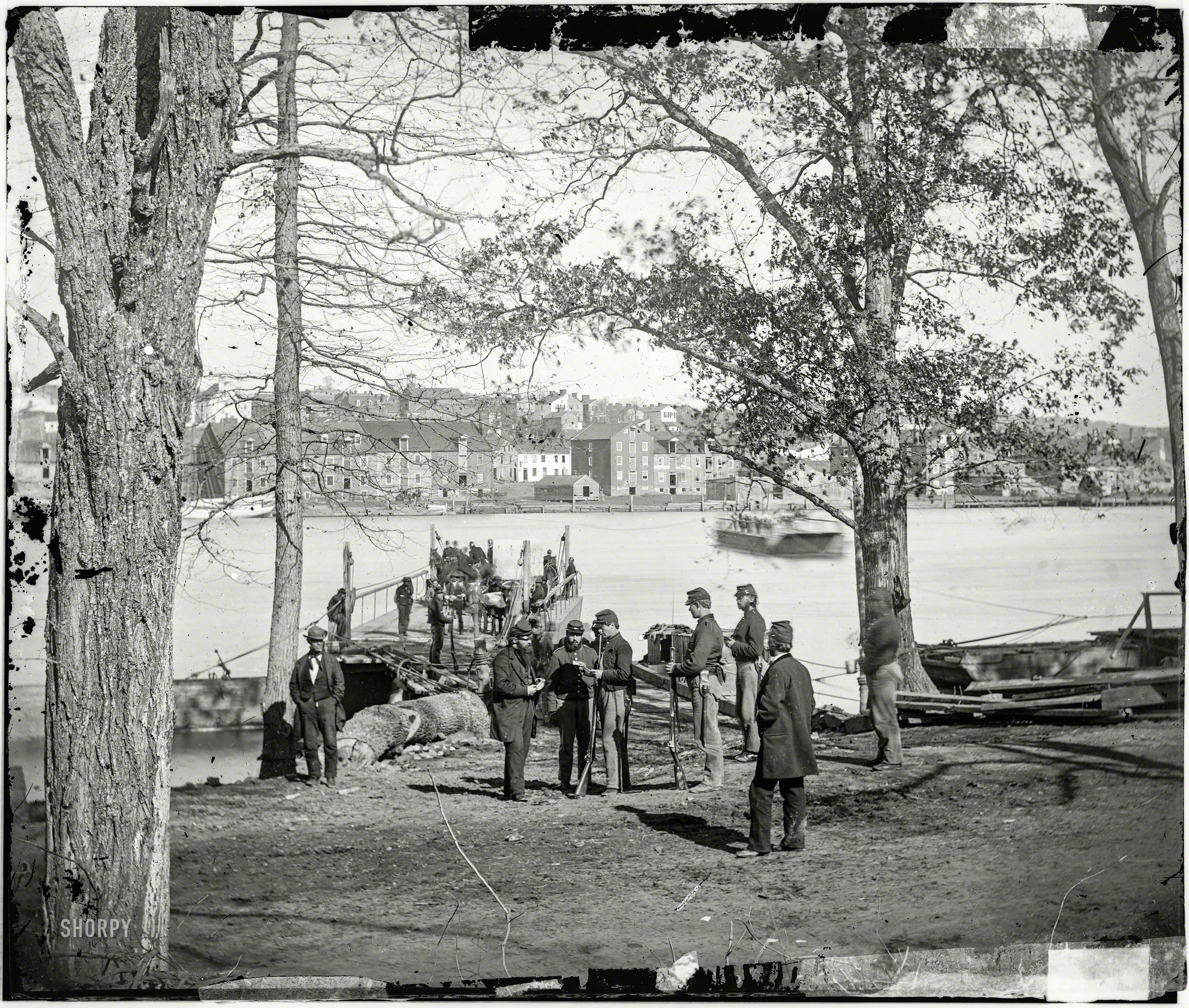 Guards at ferry landing on Mason's Island examining a pass, Washington, D.C., 1861
