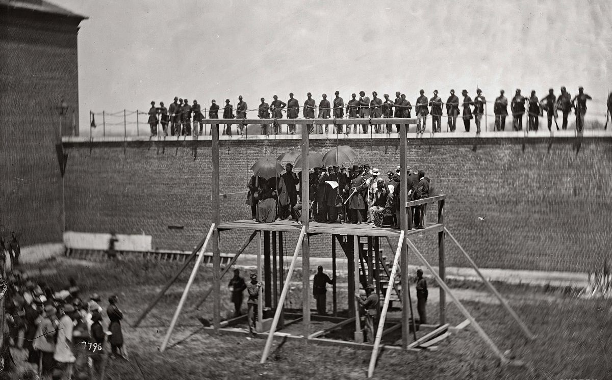 Gen. John F. Hartranft reading the death warrant to the four condemned Lincoln assassination conspirators, July 7, 1865