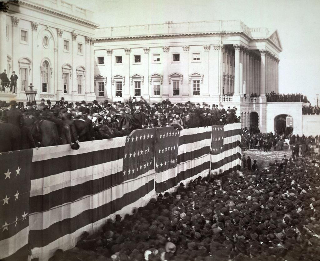 Chief Justice Morrison R Waite administering the oath of office to James A Garfield on the east portico of the US Capitol, Washington DC, 1881