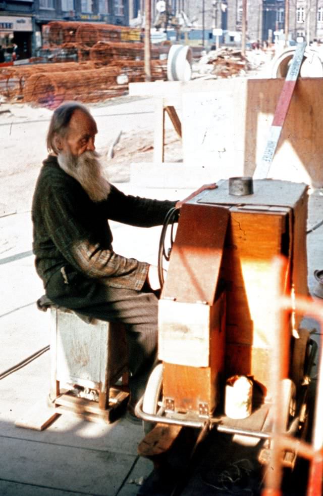 Stuttgart. Organ grinder, Germany, 1972