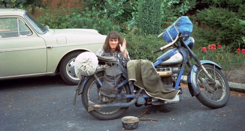 Bremen. Dutchman checking his bike at Akademie, Germany, 1975