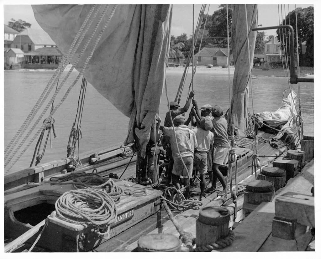 A schooner crew sailing on a ship in Bridgetown, Barbados, 1955.