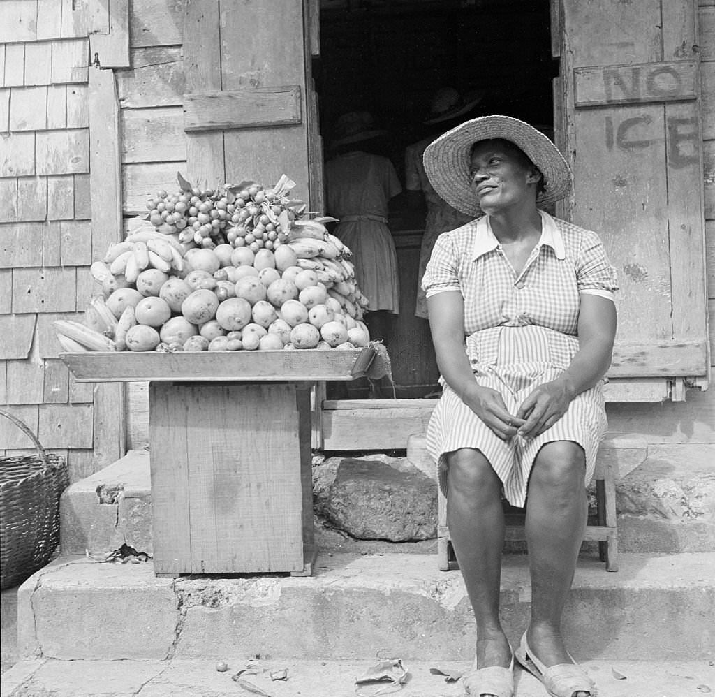A local women sells fruit in Bridgetown, 1946