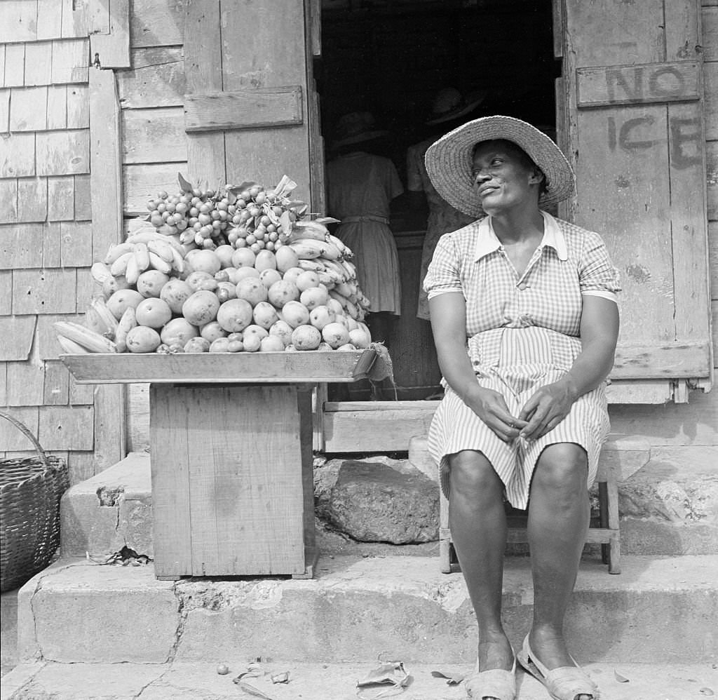 A local women sells fruit in Bridgetown, 1946