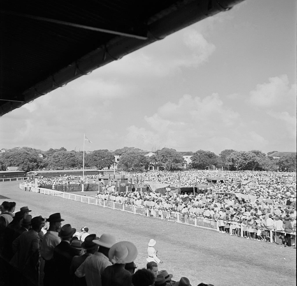 People attend a local horse race in Bridgetown, 1946