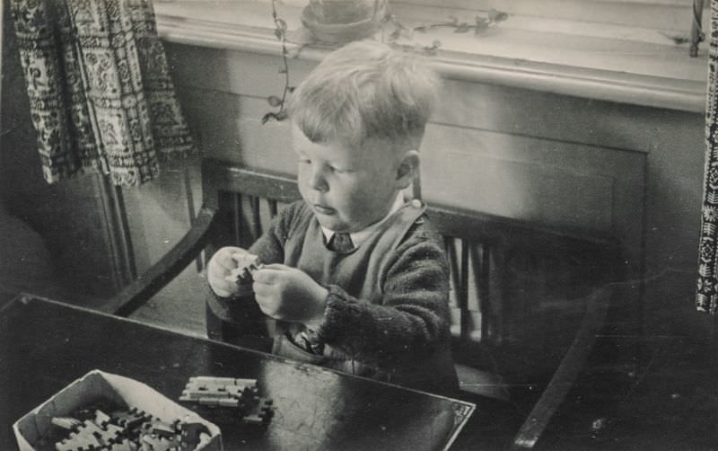 Little boy playing with building blocks