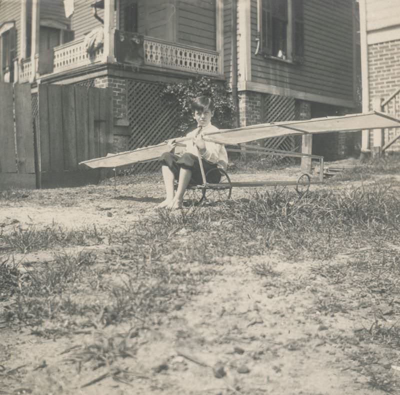 Little boy with a toy airplane