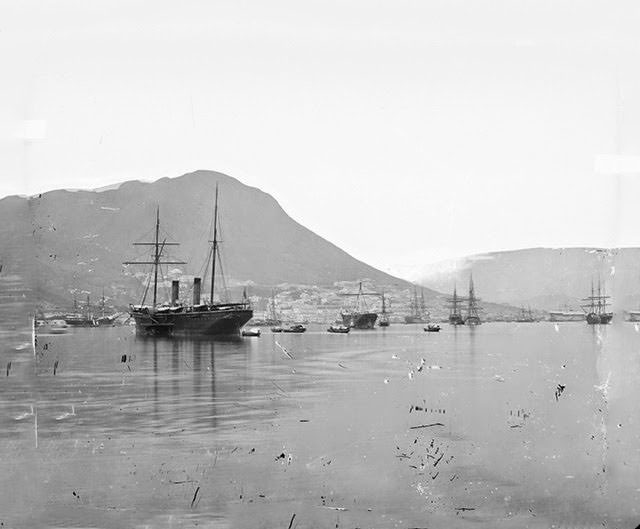 Kellett’s Island, looking west or WSW across Wanchai towards Central and the Peak, with HMS Princess Charlotte, 1858