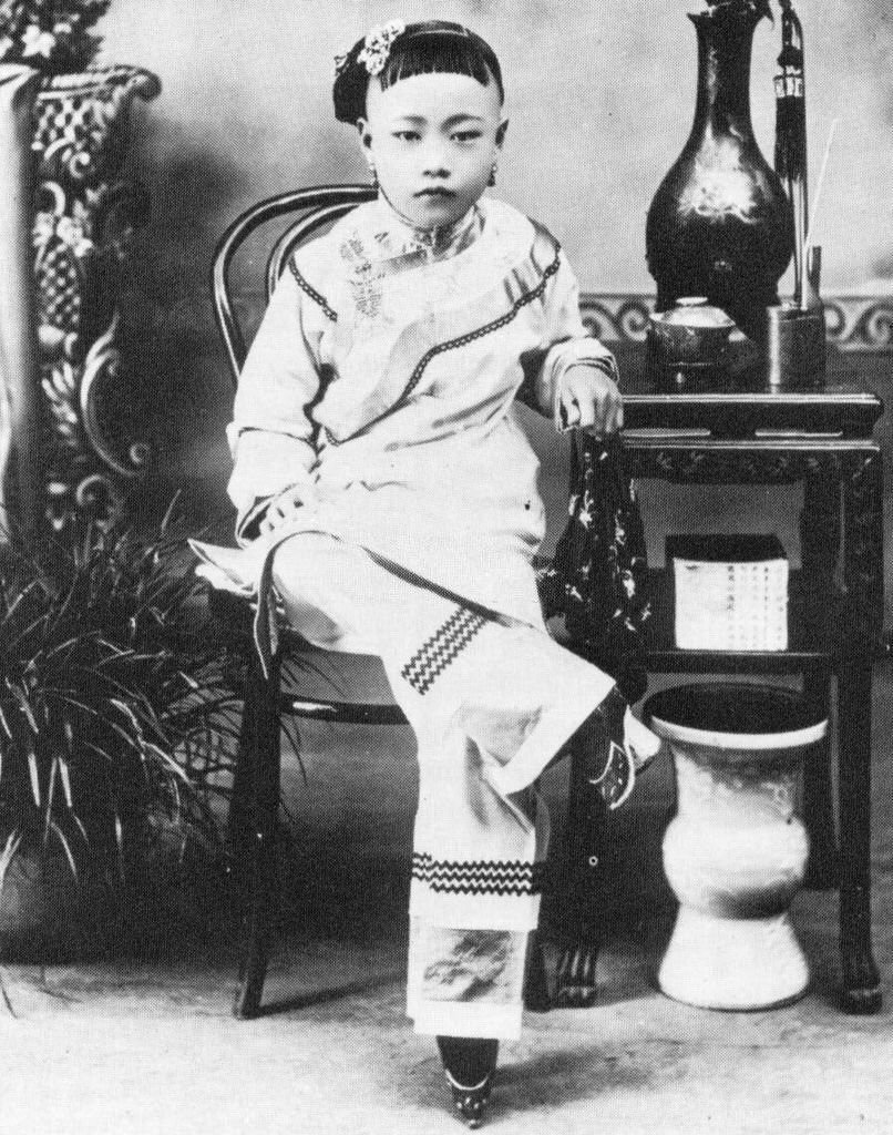 A young Han Chinese girl from a wealthy family with bound feet, late 19th century