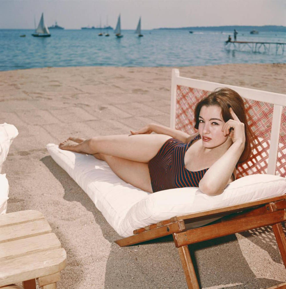 Christine Keeler Posing in a Swimsuit on a Beach in Spain and France, 1963