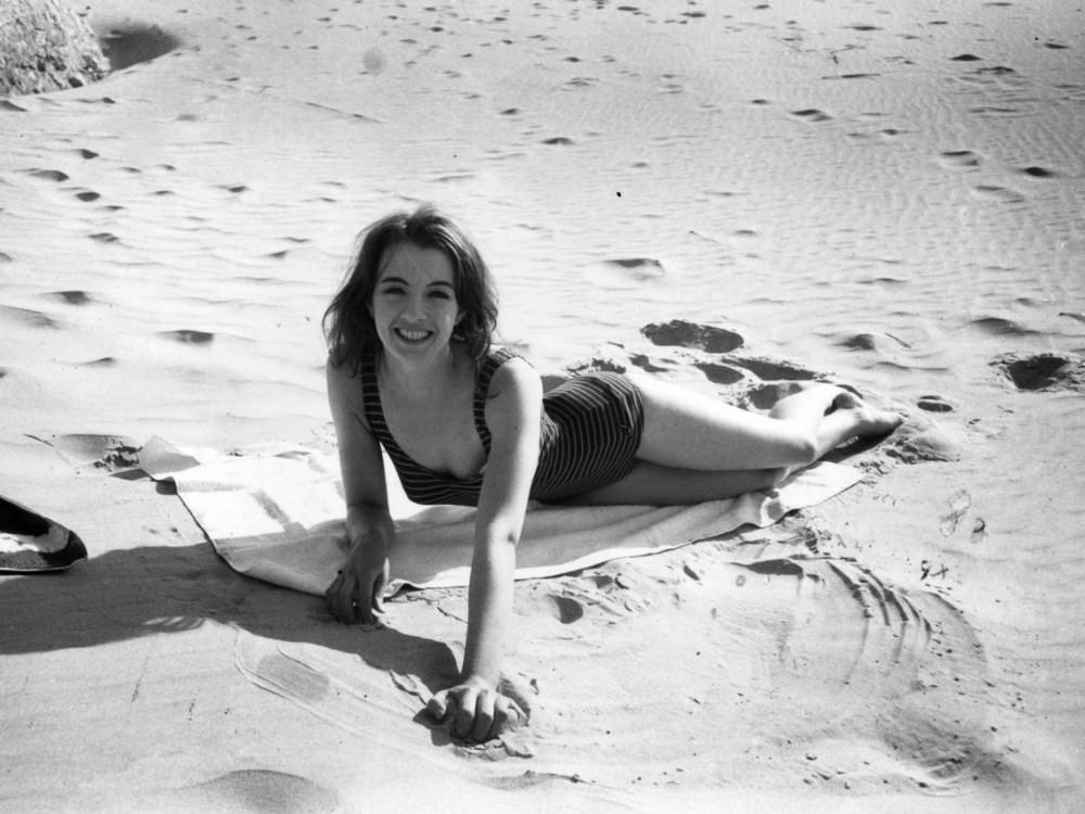 Christine Keeler Posing in a Swimsuit on a Beach in Spain and France, 1963