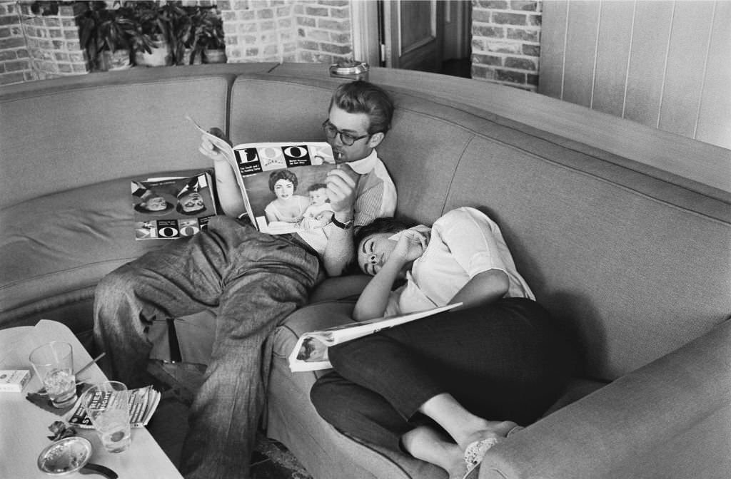 Elizabeth Tayor is taking a namp and James Dean is reading.