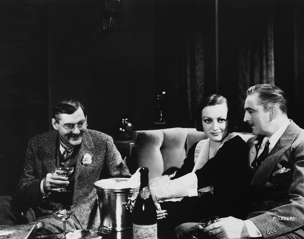 Lionel Barrymore, Joan Crawford and John Barrymore as in the 1932 film Grand Hotel.