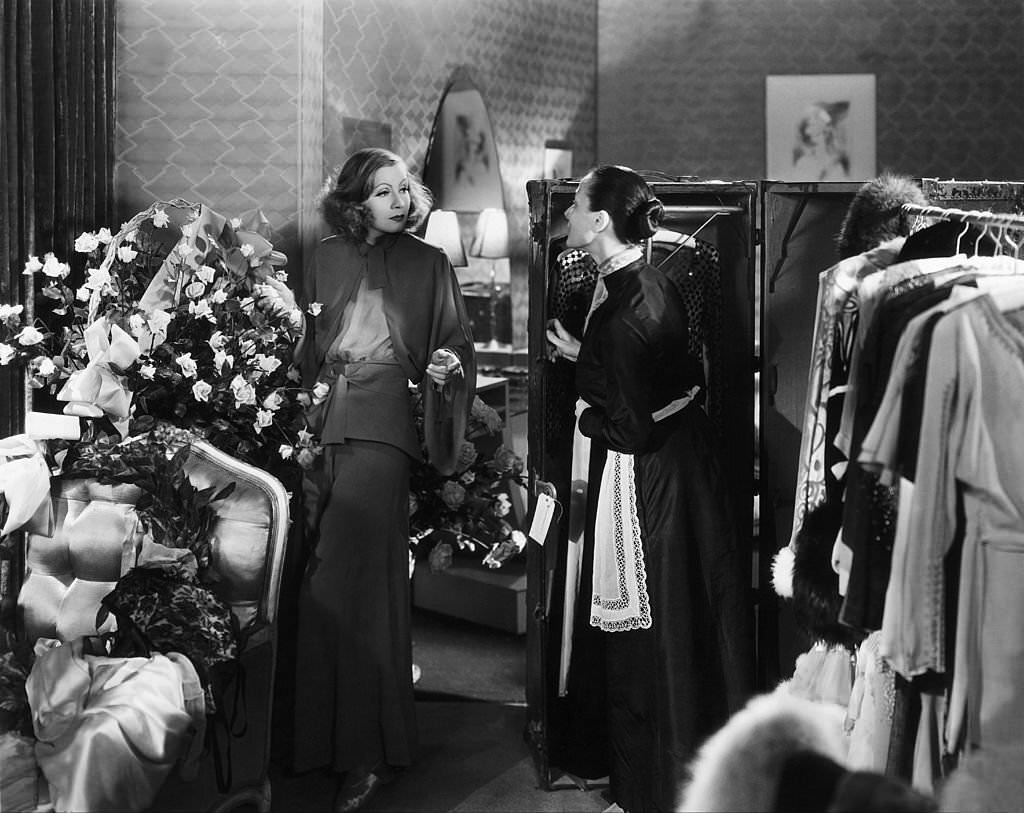 Greta Garbo with her chambermaid in a scene of the film 'Grand Hotel' in Hollywood in 1932.