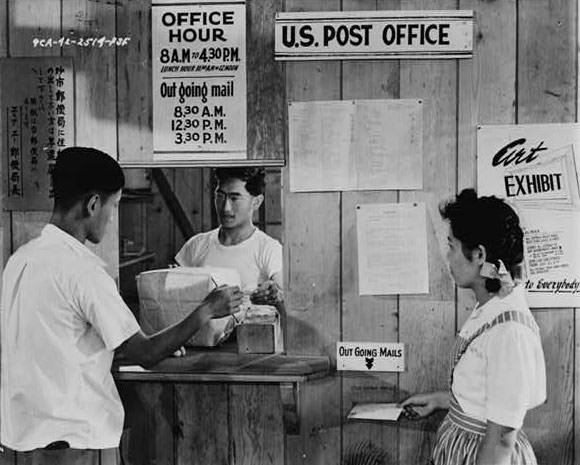 Japanese Americans using postal service at Puyallup Assembly Center for letters and packages.