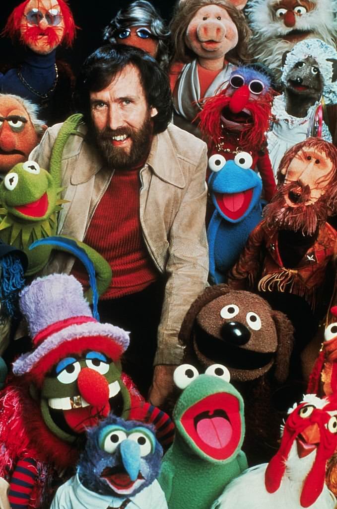Jim Henson Posing with His Creation Characters