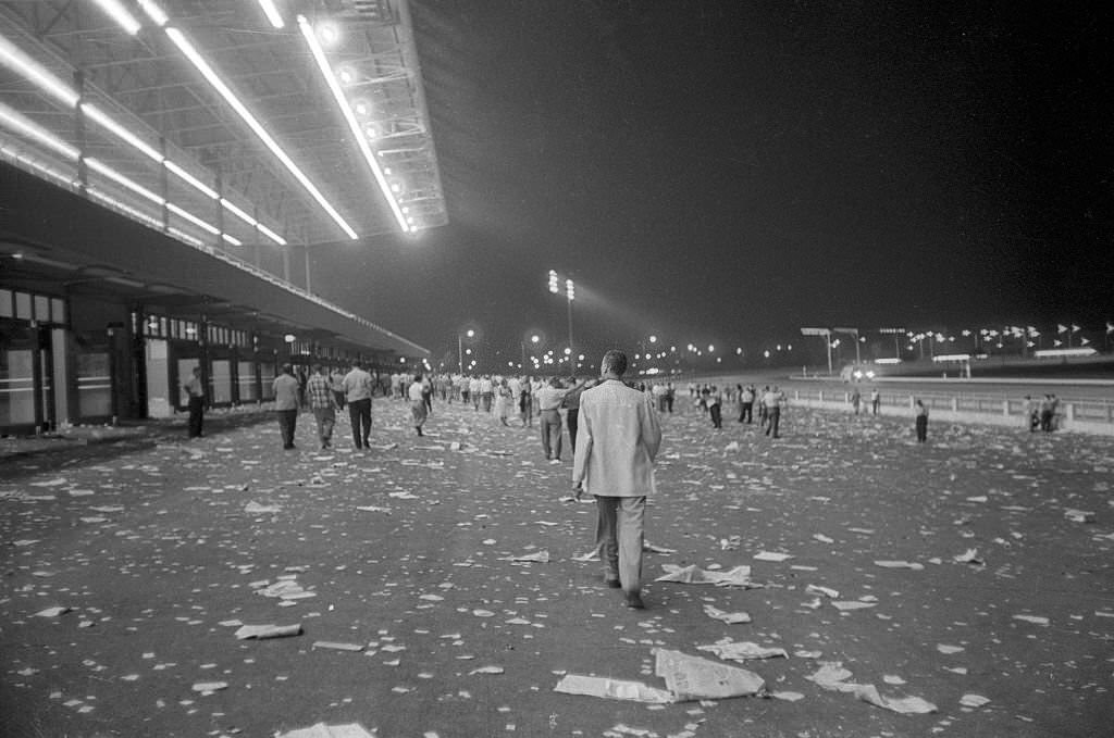 Rear view of fan during opening day of season at Roosevelt Raceway, 1957