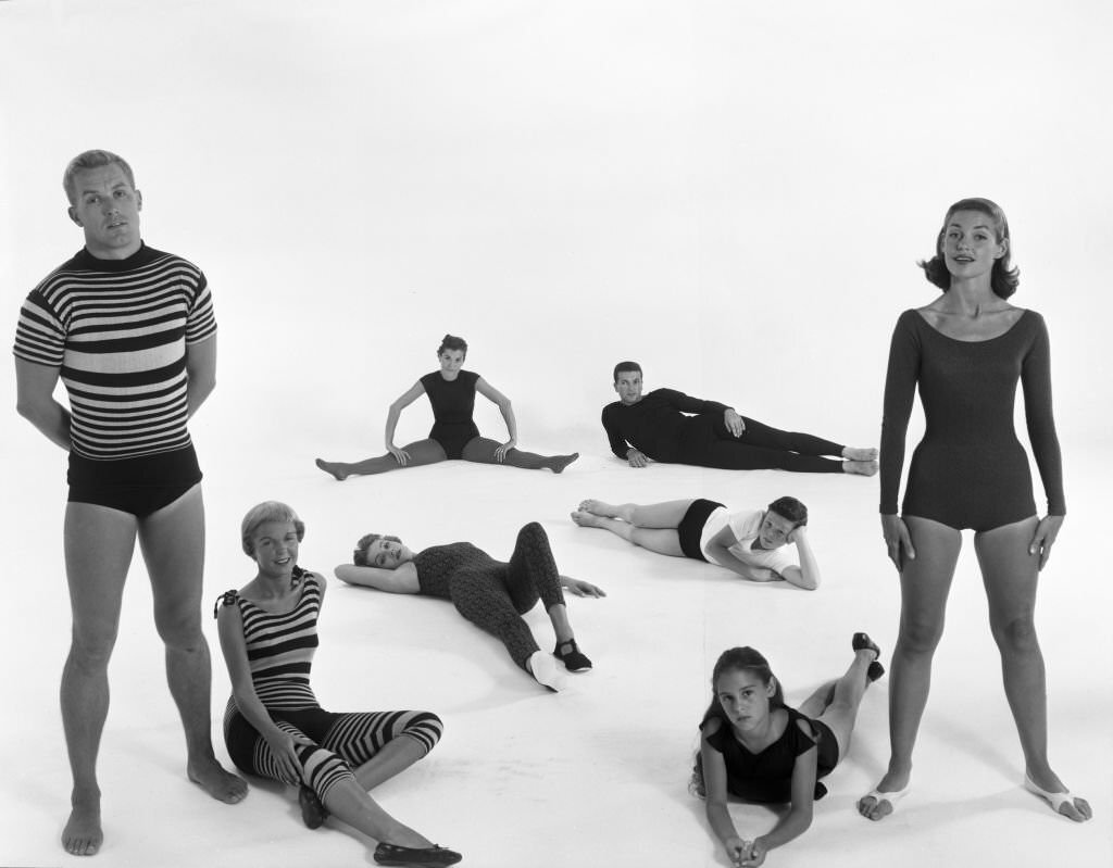 Models wearing physical fitness leotards during photo shoot, 1957