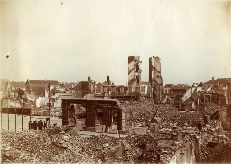 Rubble with twin towers and velocipede shop, Leuven, August 1914