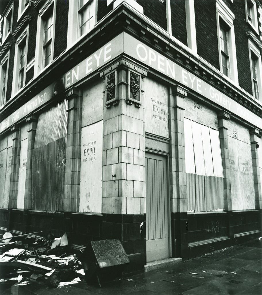 The original Open Eye gallery in Liverpool, boarded up after being fire-bombed whilst showing the work of local photographer John Stoddart, 1983.