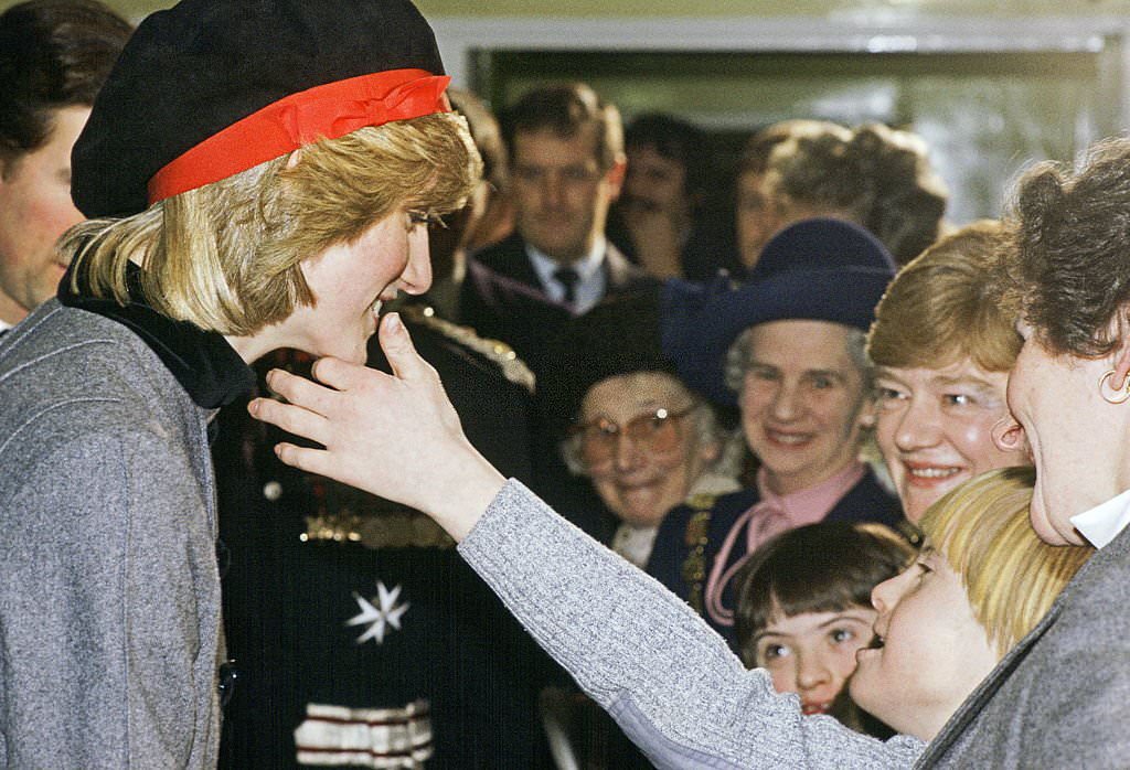 A Hug For Princess Diana from a Child during her Visit to Liverpool
