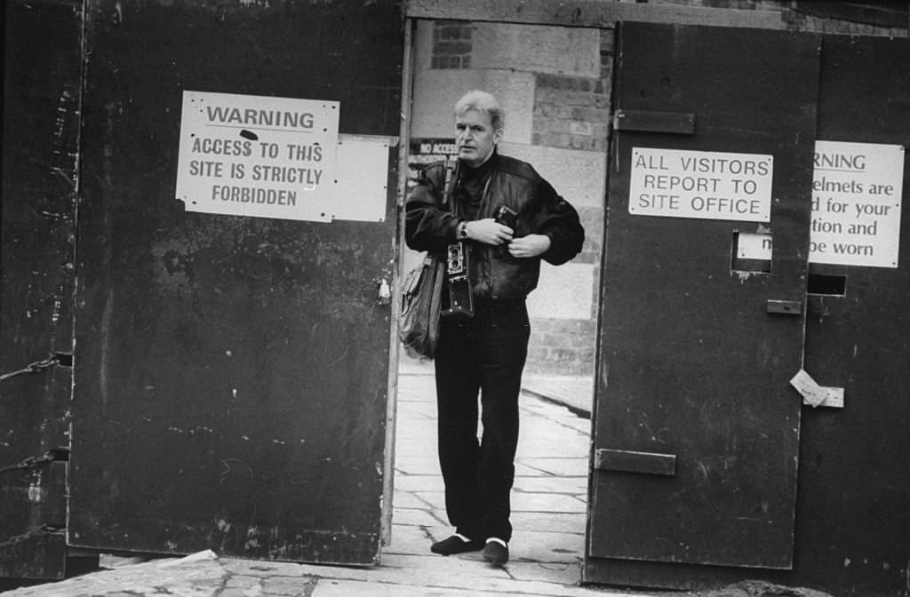 Photographer Mike McCartney, brother of Paul McCartney, shooting pictures with Rollei camera Paul bought him im 1962.