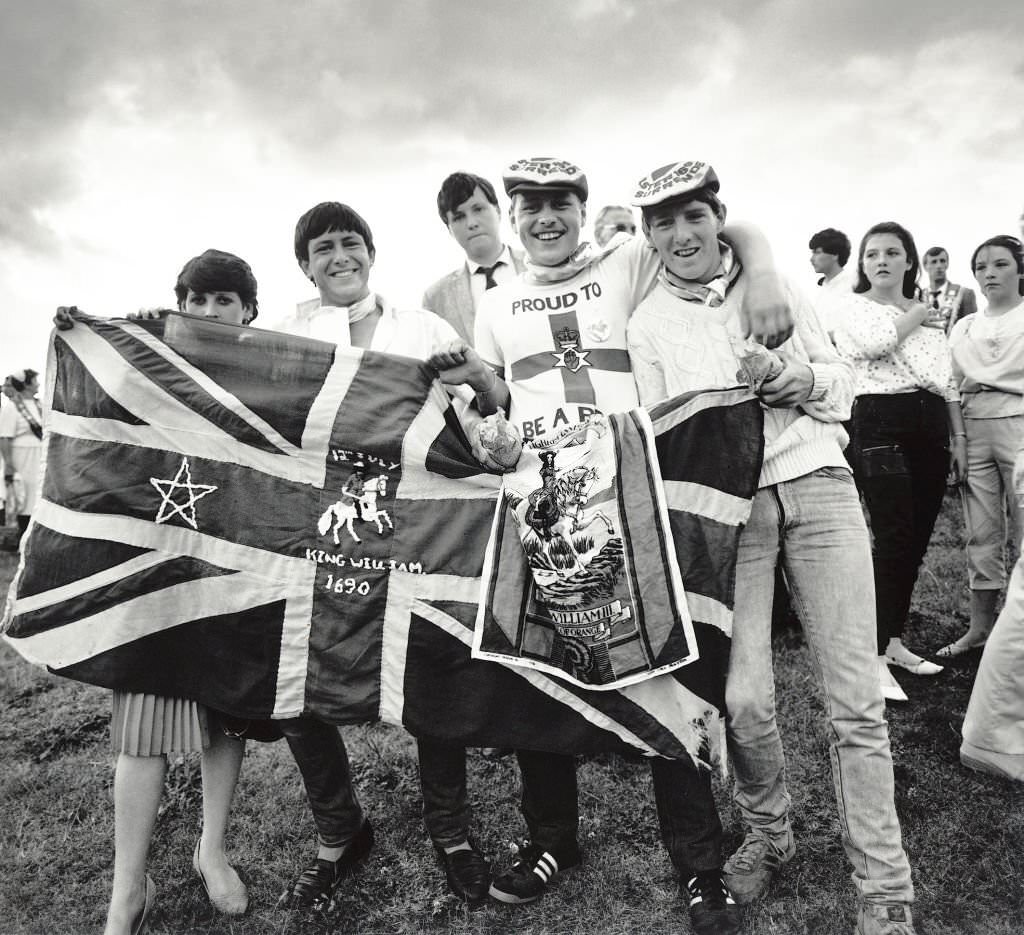 Young men with their flag during the annual Orange Order march in Liverpool, July 1982.