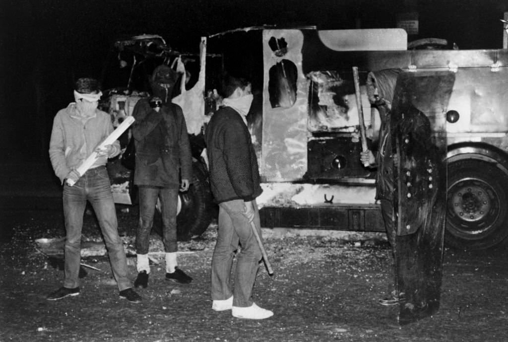 Protesters armed with sticks during the Toxteth race riots in Liverpool, July 5, 1981.