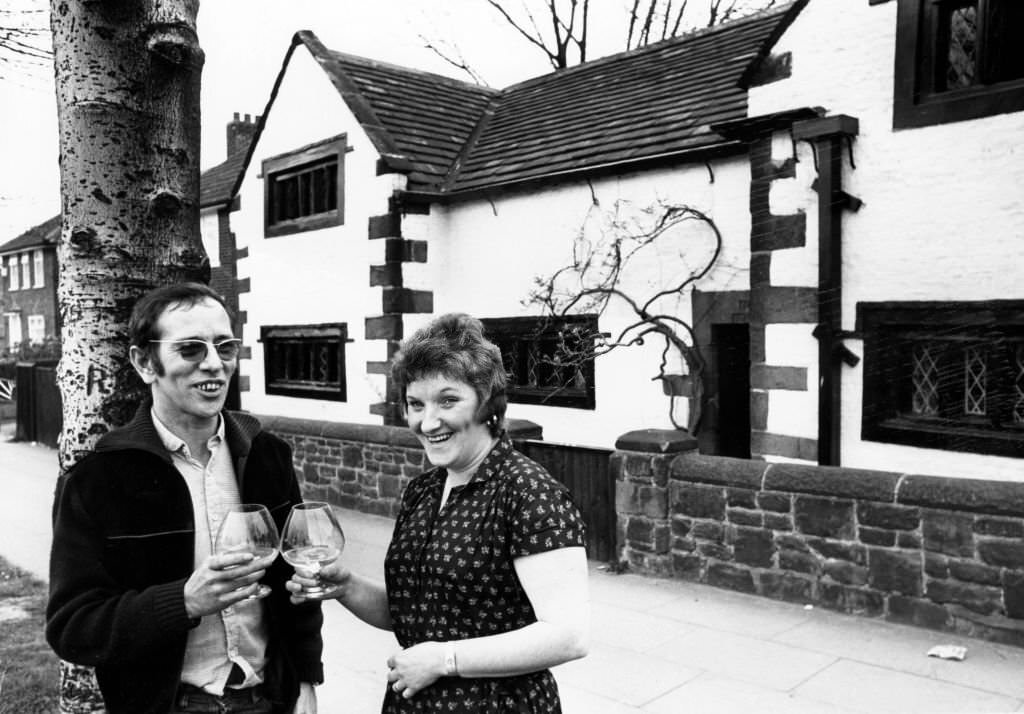 John and Dorothy Crawley outside their West Derby home, Tue Brook house. The pair are celebrating a full year as residents of the oldest dated house in Liverpool, 22nd April 1982.