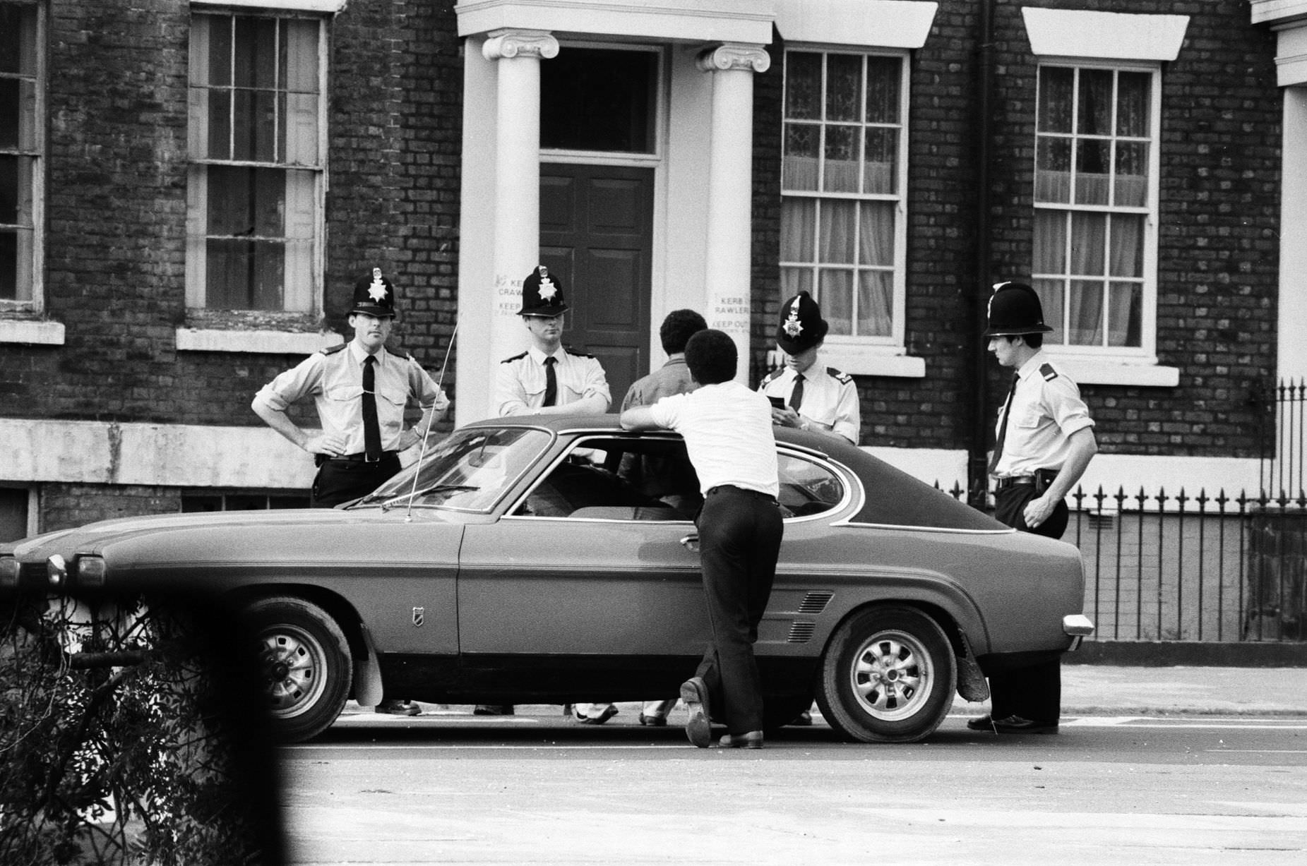Life in Toxteth, Liverpool, is one of despair for the unemployed. Black youths are stopped and searched by Police a few days after the Toxteth riots, 9th July 1981
