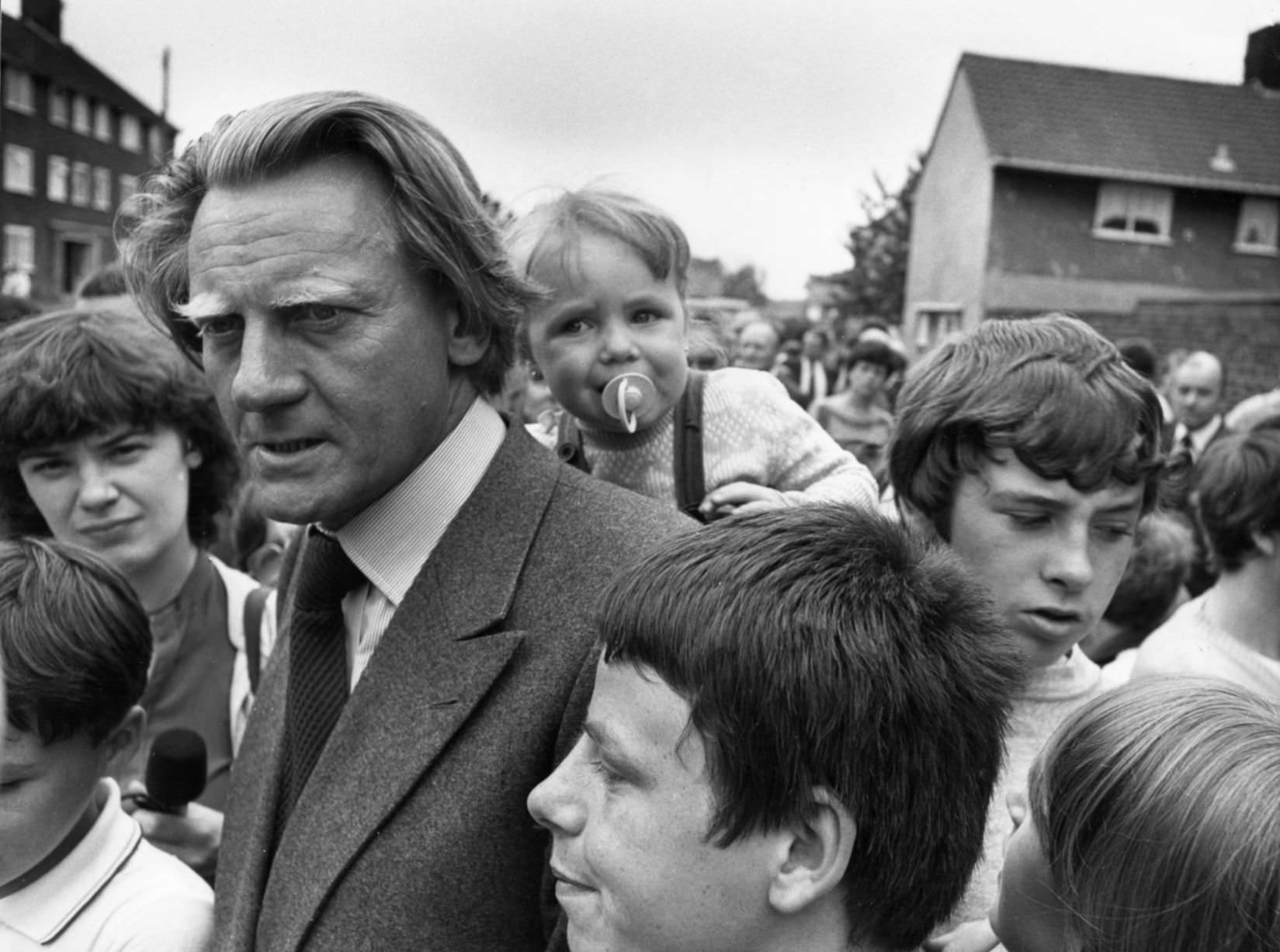Michael Heseltine Secretary of State for the Environment seen here touring Toxteth following the riots, 25th July 1981.