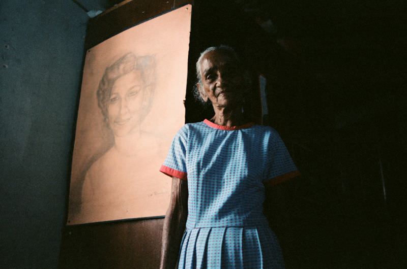 La Conchita with a drawing of her grand niece Milena Montano, Managua, Nicaragua, 1985