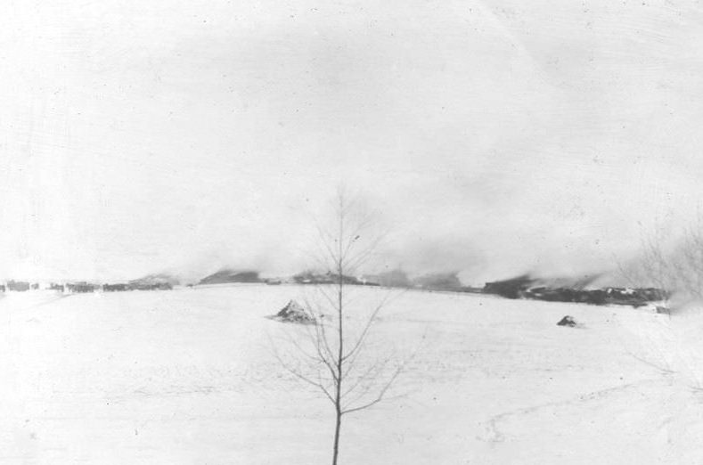 First large cremation, Changchun. Eleven stacks, 1400+ bodies