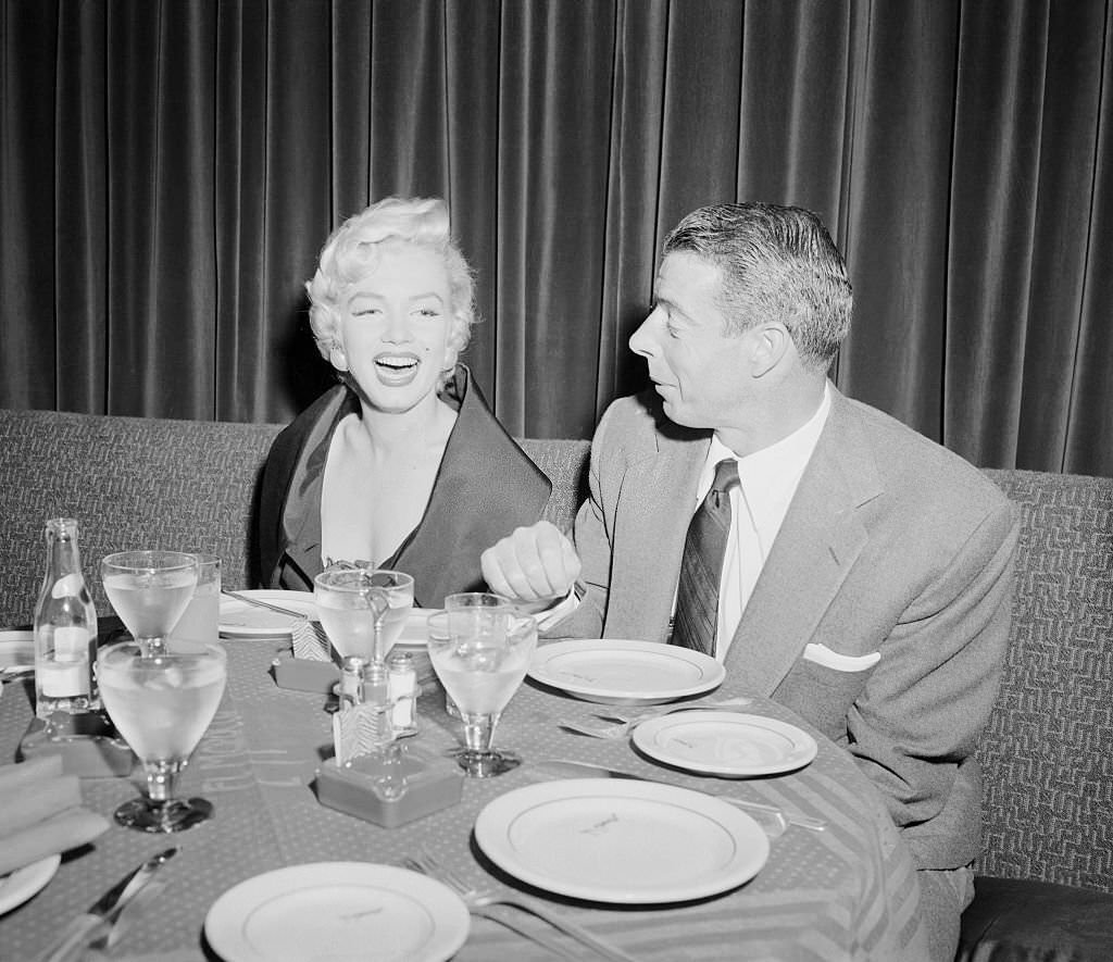 Marilyn Monroe and her husband Joe Dimaggio are show at El Morocco having dinner together this evening.