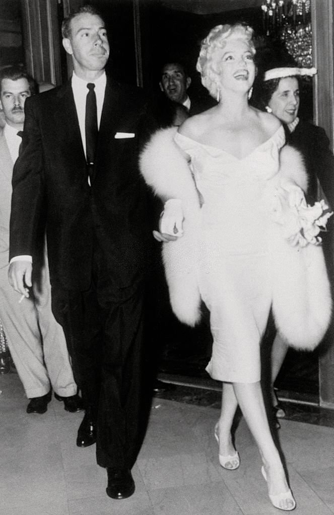 Marilyn Monroe Walking with Husband Joe DiMaggio.