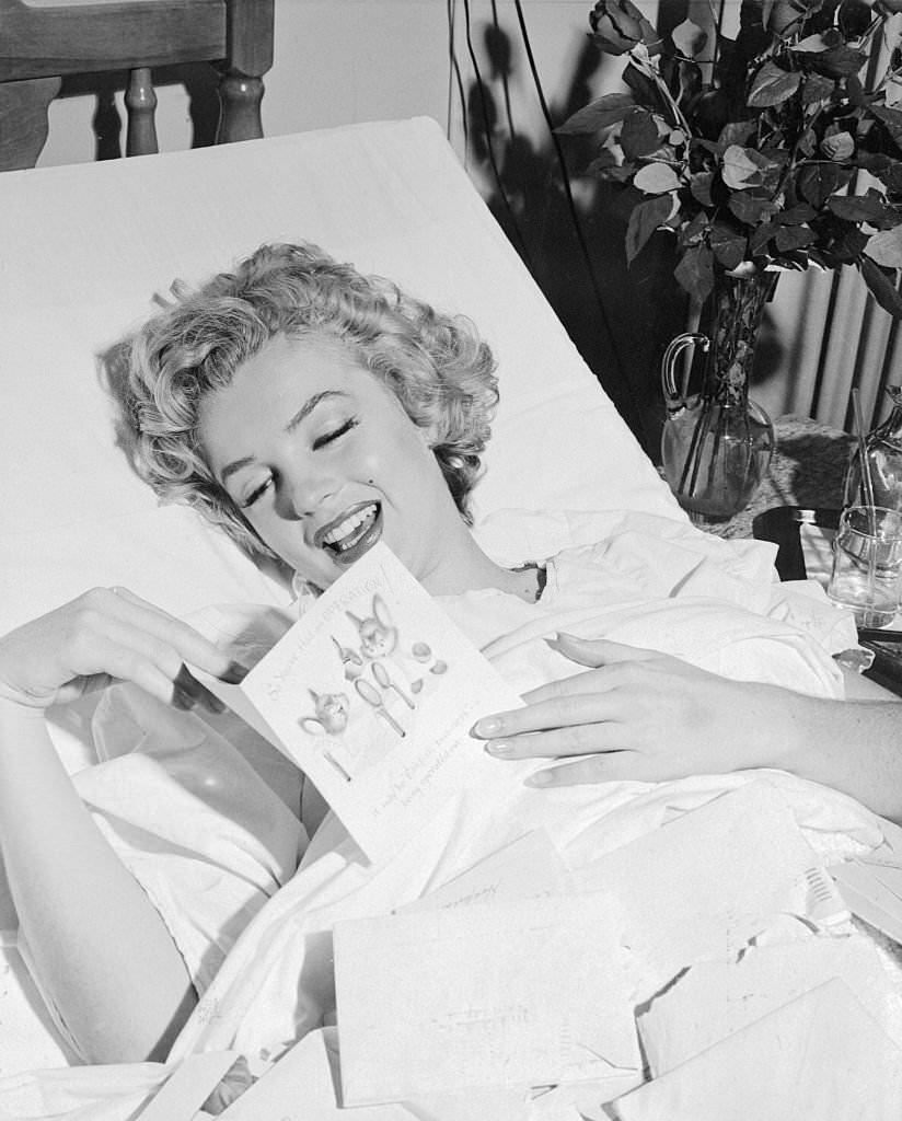 Marilyn Monroe reading Get Well Card.