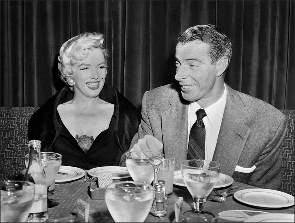 Marilyn Monroe with Joe DiMaggio.
