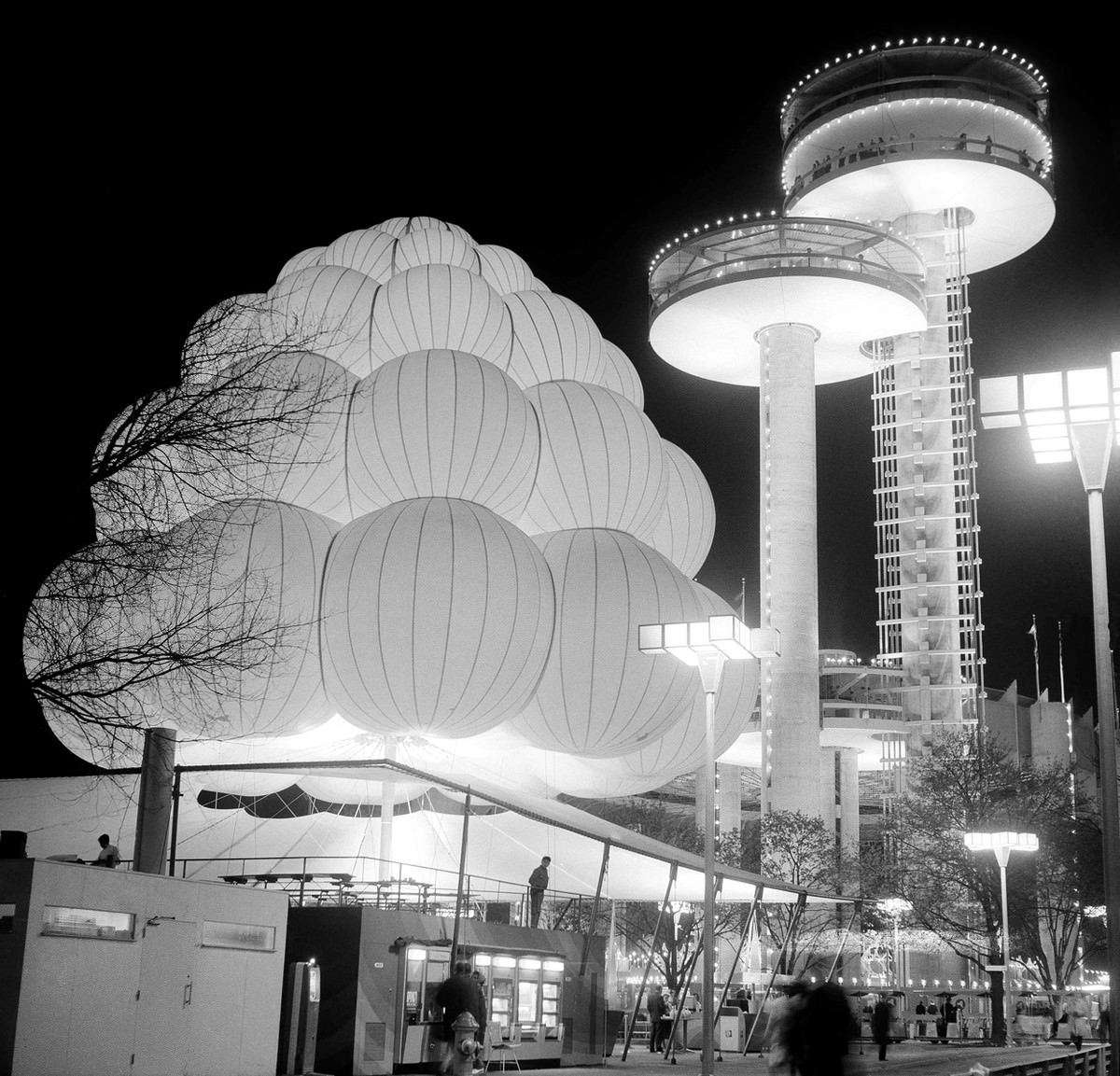 One of the Brass Rail lunch bars at the World's Fair gives the appearance of a mass of balloons tied together on August 11, 1964.
