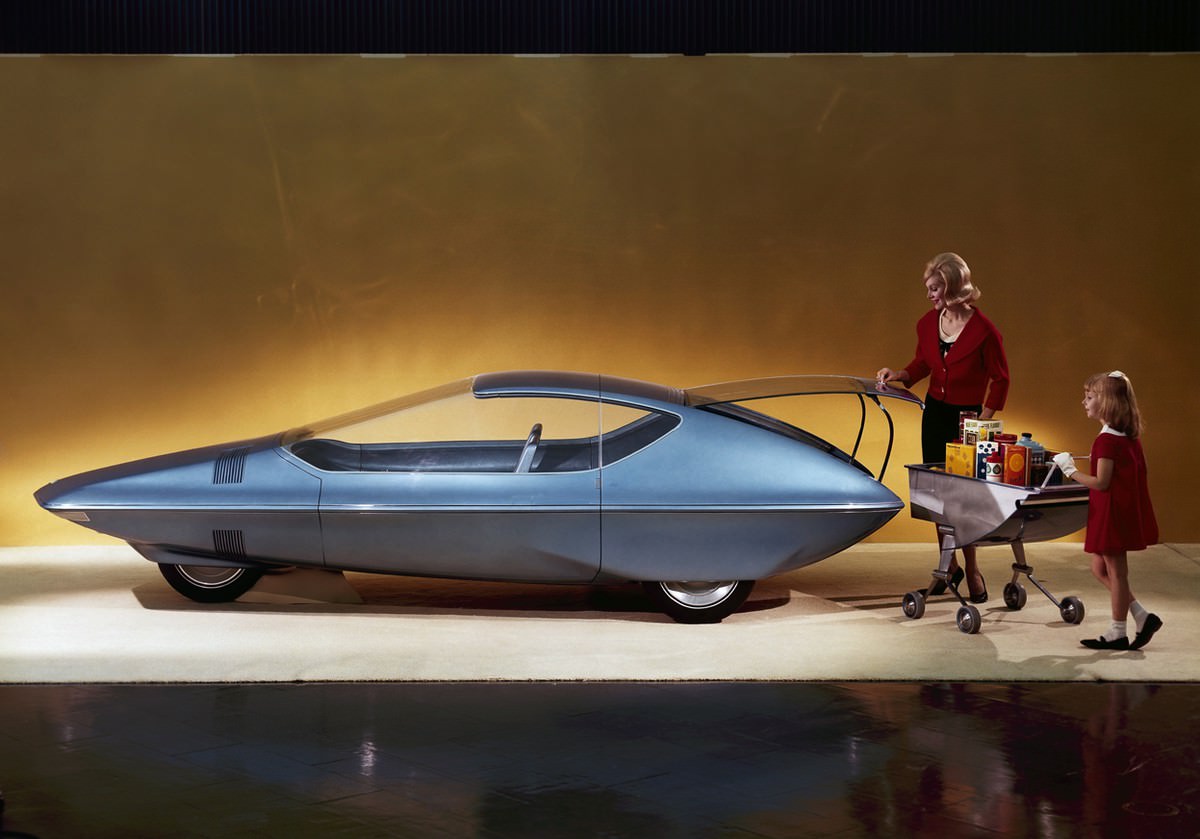 A futuristic grocery shopping trip, envisioned at teh General Motors Pavilion at the World's Fair, New York in 1964.