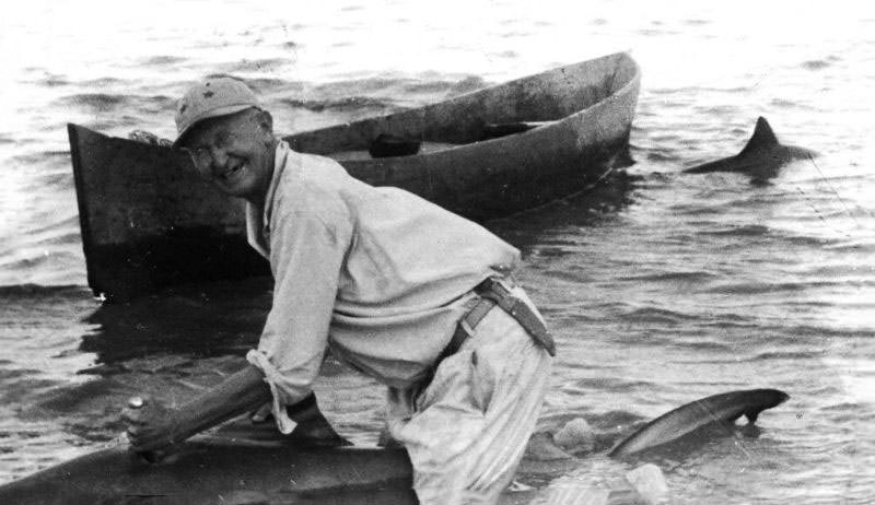 Man catching a fresh-water shark in Lake Managua, Nicaragua